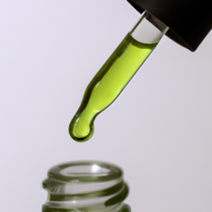 A close-up of a glass bottle containing a green, herbal-looking liquid with a dropper.