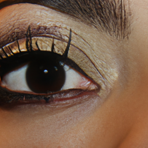 A close-up of an eye with a dramatic winged eyeliner look.