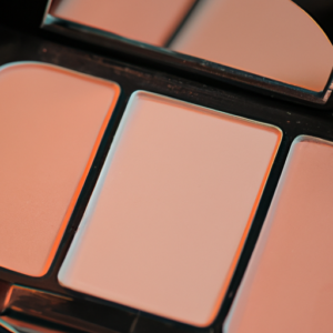 A close-up of a peach colored blush palette with a soft, shimmery sheen.