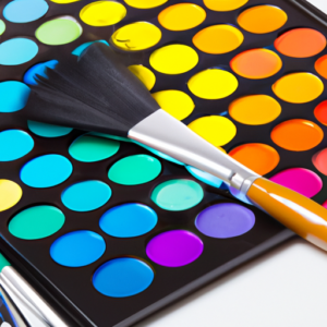 A makeup brush and palette with a rainbow of colors.