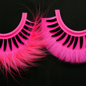 A pair of bright pink eyelashes against a black background.